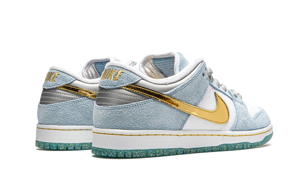 SB DUNK LOW "Sean Cliver - Holiday Special"